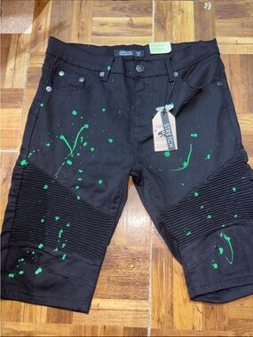 NWTTrestles Supply black moto denim shorts with neon green paint splat, Men’s 32